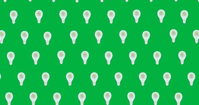 Digital animation of tree in multiple light bulb icons falling against black background