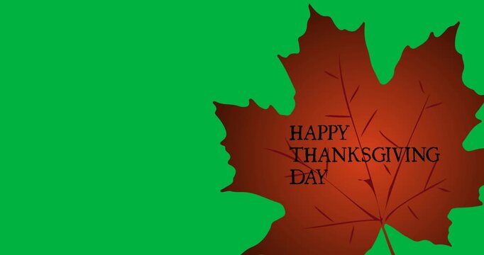 Digital animation of happy thanksgiving text on autumn maple leaf against black background
