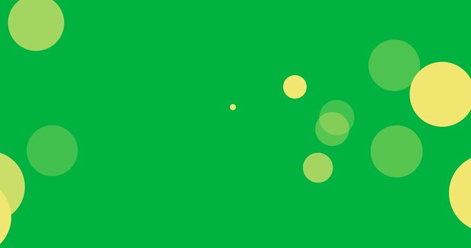 Digital animation of multiple yellow spots floating against black background