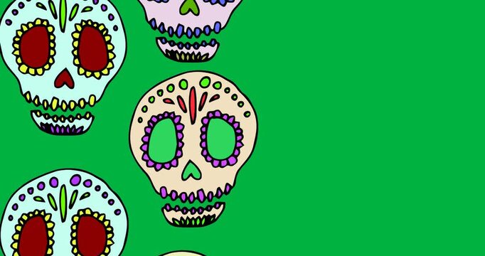 Digital animation of multiple decorated skull icons falling against white background