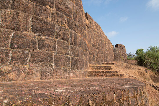 Bankot Fort or Himmatgad Fort or Fort Victoria, It was won by Maratha Koli Admiral[1] Kanhoji Angre in 1700 and named "Himmatgad". The fort is built by Lateritic rocks.