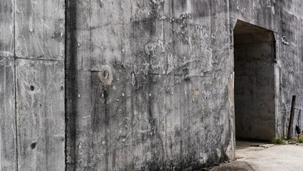 Grungy Concrete Wall Texture with an Archway and Rough Surface Details © yashis007