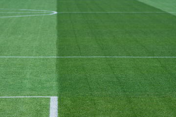 Obraz premium High-Resolution International-Standard Football Pitch with Contrasting Striped Turf for Background Use