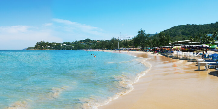 A beautiful view of Kata Noi Beach with its soft sands, turquoise waters at summer sunny day in Phuket, Thailand.