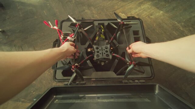 Drone setup process, Diligent technician methodically assembles and inspects drone equipment for flight readiness