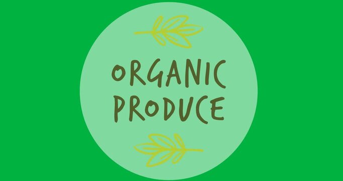 Organic produce text with leaves icon over a grey round banner on black background
