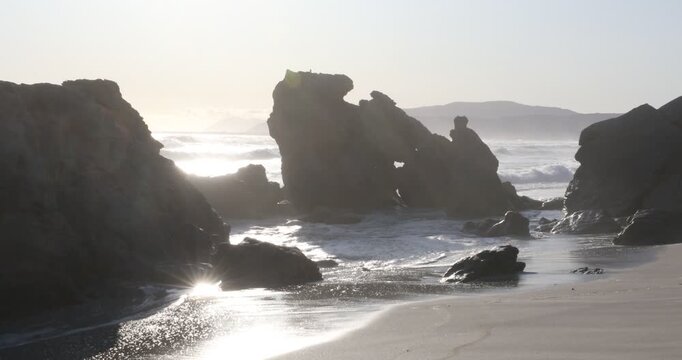 teenage girl overlooking beautiful rocky coastline, Sopies Klip, Hermanus, South Africa