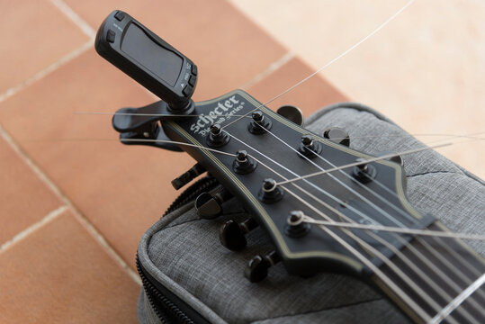 Nakhonpathom,Thailand - 20 March, 2026: 7-String Electric Guitar Schecter KM-7 Keith Merrow Signature Model on desk 