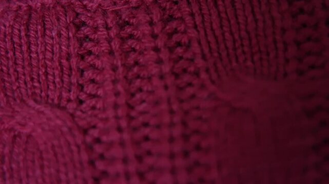 Moving over a textured red knitted top