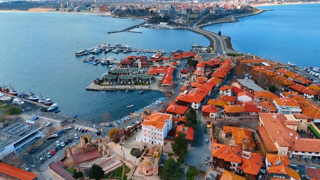 Aerial view of the isthmus connecting Nessebar old town. High angle shot of bridge road leading to the peninsula