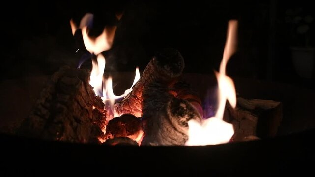Close-Up of Burning Firewood and Flames in Darkness at Night&ndash; Close Up Fire in Dark Background 4K No Sound