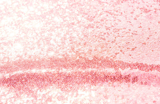 Abstract blurred shiny pink fabric texture background, pink fabric pattern background