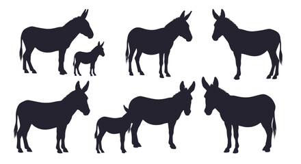 Fototapeta premium Collection of black silhouettes of donkeys and their foals in various standing poses, illustrating farm animals on a clean white background.