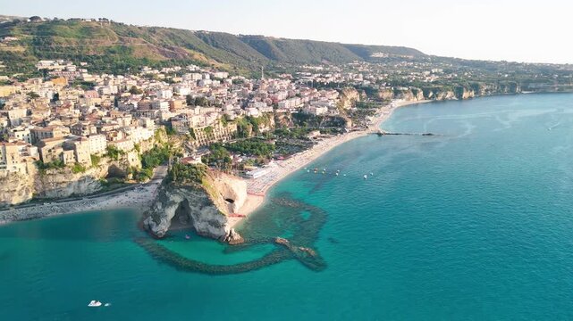 Summer aerial panorama of Sanctuary of Santa Maria dell&rsquo;Isola with dramatic coastal scenery