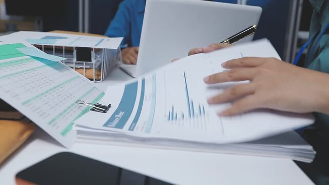 Businessman and Certified Public Accountant (CPA) auditor providing accounting and auditing services in the same company and stock market chart data and anti bribery of accounting