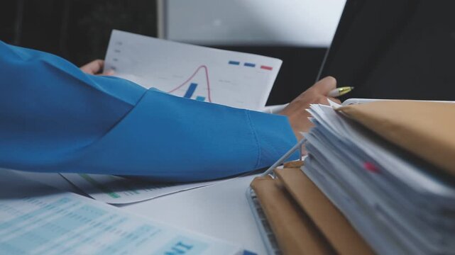 Businessman and Certified Public Accountant (CPA) auditor providing accounting and auditing services in the same company and stock market chart data and anti bribery of accounting