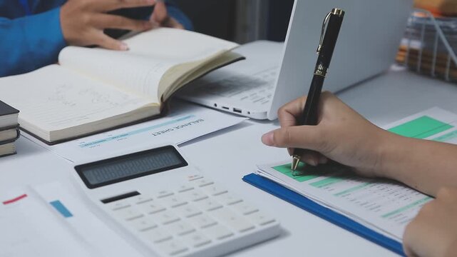 Businessman and Certified Public Accountant (CPA) auditor providing accounting and auditing services in the same company and stock market chart data and anti bribery of accounting
