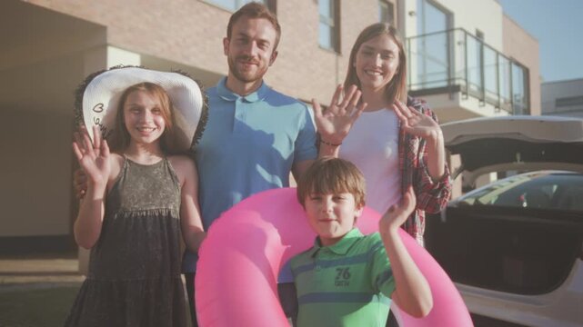 Joyful family gets ready outside, Enthusiastic family getting ready for sunny neighborhood pool adventure
