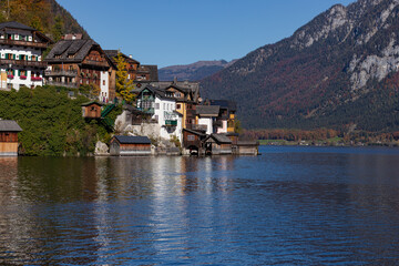 Fototapeta premium Picturesque Hallstatt Village with Traditional Houses on Lake Hallstatt and Autumn Mountains