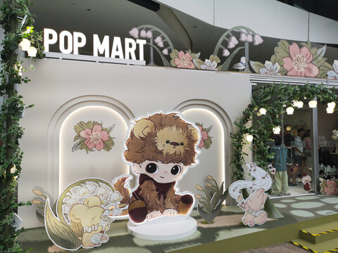 Pop Mart DIMOO themed pop-up store showcasing designer toy collectibles and immersive retail display, highlighting branding, consumer culture, and modern shopping experience