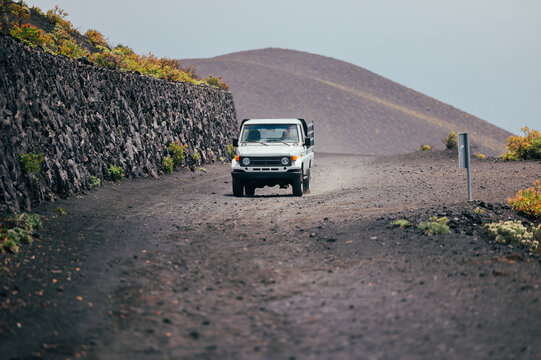 Off-road pickup on volcanic road in La Palma, Canary Islands