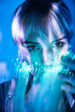 Young woman in a futuristic metaverse environment