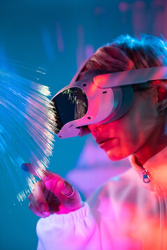 Futuristic vision of young woman in virtual reality