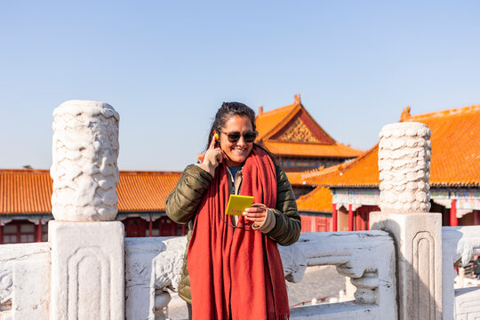 Tourist with audio guide in Beijing