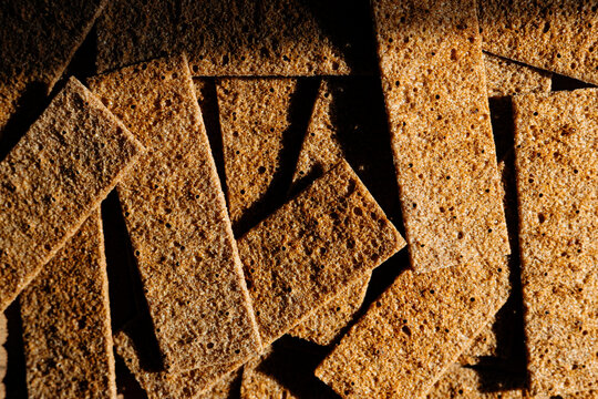 Crunchy rye crispbread snack arrangement in sunlight