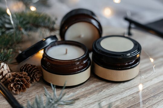 Cozy themed candles in a holiday setting mockup