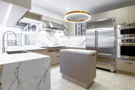 Luxury minimalist kitchen interior with marble and steel