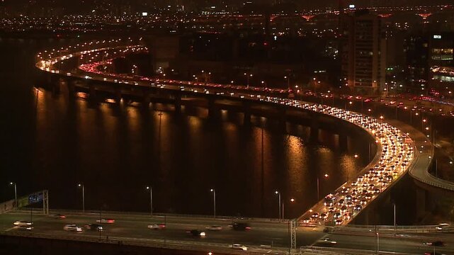 Cinematic night street view of Seoul's modern architecture and lights