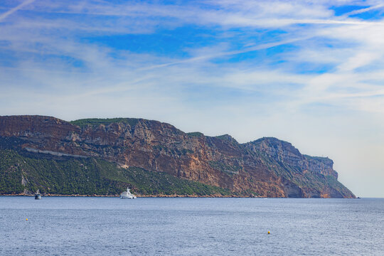 View from the Calanque de Port-Miou in the Calanques national park towards the cliffs of Cassis at the mediterranean coast in the south of France.