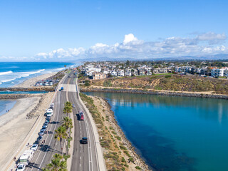 Aerial View Of Agua Hedionda Lagoon Inlet and Carlsbad State Beach Looking North Up The Coast In Southern California © Oak City Drone
