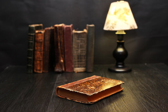 Old Books And Lamp