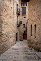 Fototapeta premium Vertical photo of a typical street in the historic center of Valderrobres, Teruel, Aragon, Spain