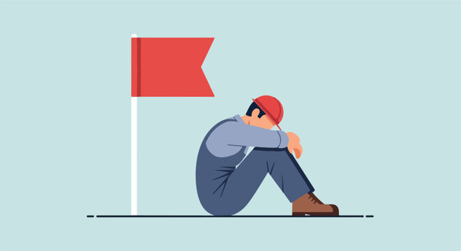 Sad construction worker in a hard hat sits discouraged by a red warning flag