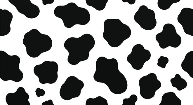 Seamless black and white cow print pattern with irregular organic spots for textile design