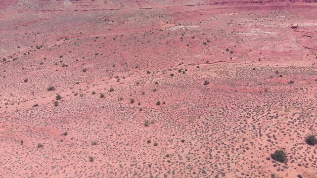 Monument Valley Mountains and sand, aerial view from drone. Slow motion