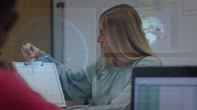 Business woman pointing to pad with pen, explaining notes while HUD dial and globe overlaying pad