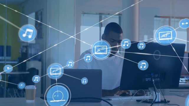 Blue icon appearing near laptop, icons connecting from monitor while worker typing, showing data