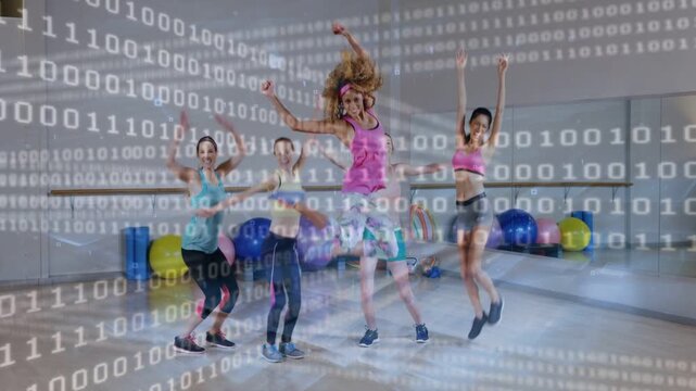 Instructor cueing 5 women doing squats to sync jumps for fitness binary digits streaming over group