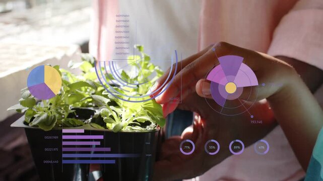 Child hovering then touching sprouts while man holding tray guiding hand charts shifting for tech