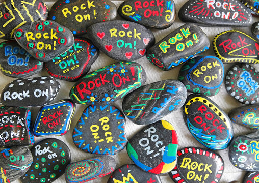 Pocket size painted rocks on display