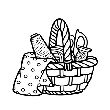 Wicker craft basket with thread and scissors isolated on a white background