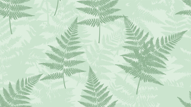 Calm seamless pattern featuring green fern leaves in various orientations and shades over a pale green background for textile prints.