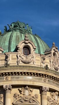 Heritage architect inspecting copper dome cinematic closeup