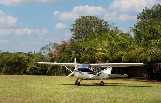 Small bush plane arrived at a remote landing strip in the Pantanal