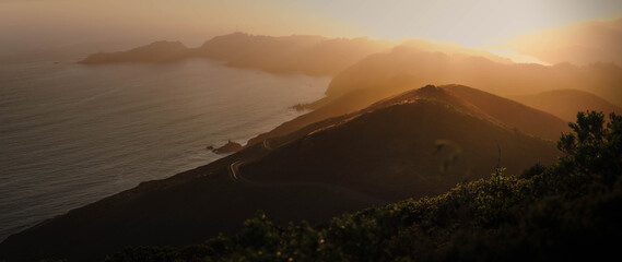 Panoramic Golden Sunset Over Coastal Headlands and Pacific Ocean, California © brendan