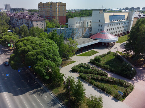 Aerial drone view of Tyumen State Institute of Culture, St. Dmitry Donskoy Church and Gubkin Square in Tyumen, Russia, May 25, 2021